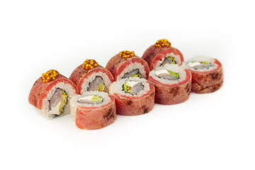 Sushi roll with tuna tataki with French mustard on a white plate, ingredients Seared tuna, sea...