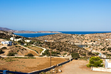 Fototapeta na wymiar Schinoussa island, panoramic view from Chora village situated uphill from the port - Lesser Cyclades, Greece 