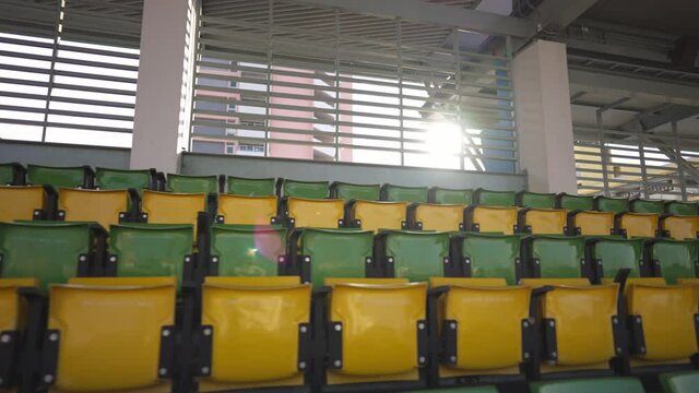 Empty seats in a stadium During the absence of sports events