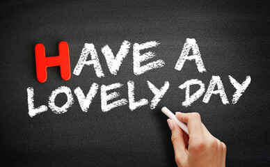 Fototapeta premium Have a Lovely Day text on blackboard, concept background