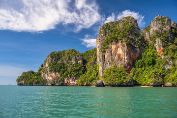 Fototapeta premium Tropical islands view with ocean blue sea water at Railay Beach, Krabi Thailand nature landscape
