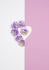 Three magenta blooms getting out from violet to white background.