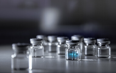 Vaccine prototype Bottle of covid-19 and Syringe. Coronavirus Vaccine in laboratory, hospital or pharmacy. Medicine bottle for injection . Drug Ampoule Mockup. Vaccination concept.