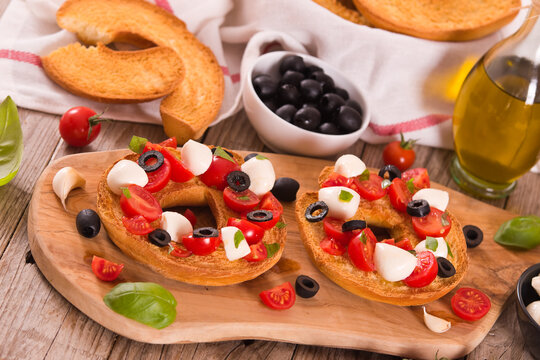 Friselle with tomatoes and mozzarella cheese.