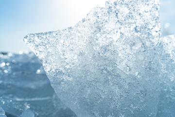 Stacks of drift ice piled up against the dutch coast with crystal clear sunlight © fotografiecor