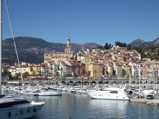 Harbor of Menton, France, with the old town in the background