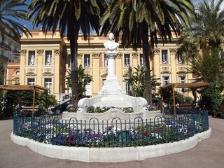 statue of the famous artist jean cocteau in front of the town hall of Menton, France