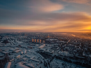 Fototapeta na wymiar rising sun illuminates the beautiful home town shackled by frost