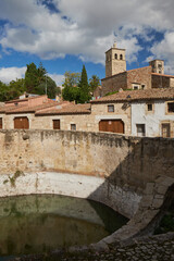 Obraz premium View of Trujillo (Caceres) with the Altamirano Arab cistern in the foreground. Extremadura monumental town.