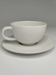 Fototapeta na wymiar white cup and saucer