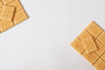 Sweet biscuits on white background with space for text