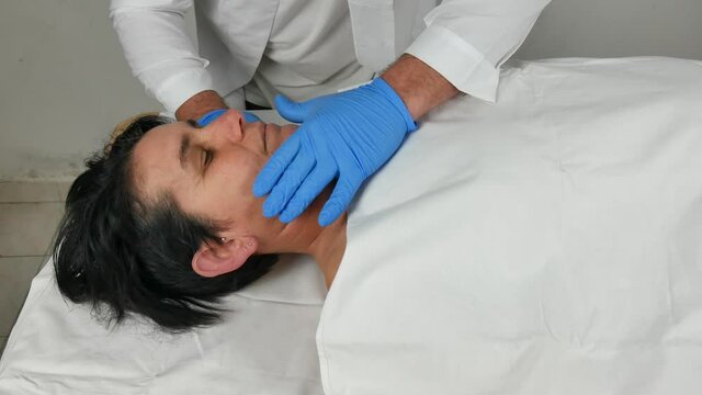 close-up of a corpse being autopsied possibly deceased from covid-19