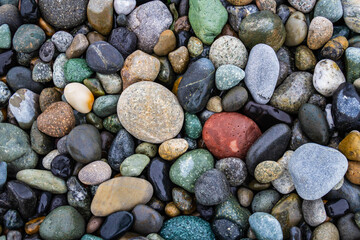 Colorful smooth rocks on the beach