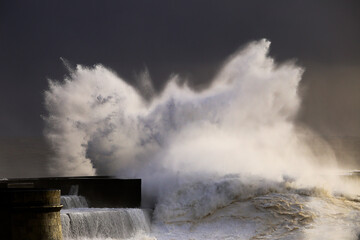 big wave during a storm in Porto, Portugal - 415617670