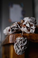 a bunch of dried sugar persimmon fruits on the edge of the textured table