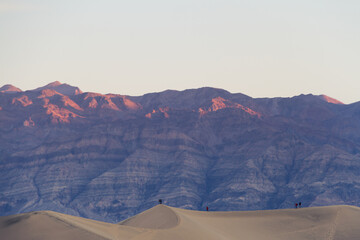 Naklejka na ściany i meble Sand dunes in Death Valley near stovepipe wells during sunrise in Death Valley National Park.