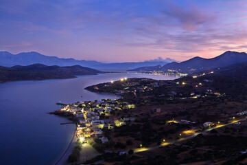 Blue hour view of Plaka village, near Elounda and Agios Nikolaos towns, in Lasithi region, Crete island, Greece, Europe