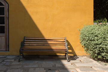 Wooden bench chair exterior with light shade