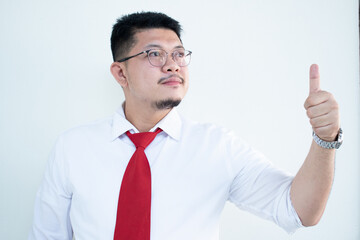Portrait of a handsome Asian man wearing glasses. Wear a white shirt and red tie.