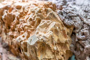 Original textured surface of of a natural coarse stone