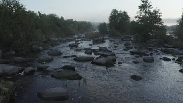 Southern Buh river. Drone aerial footage at early spring morning