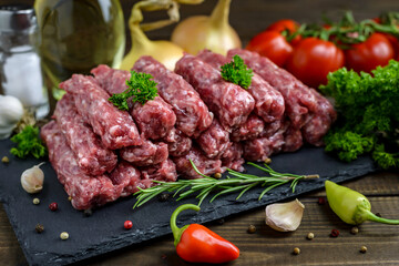Traditional Balkan raw minced meat cevapcici or cevapi