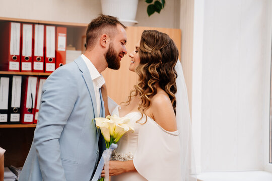 Couple Of Newlyweds In The Civil Registry Office.