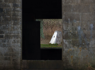 view from a reinforced British Army military bunker pill box square window salisbury plain, wiltshire 
