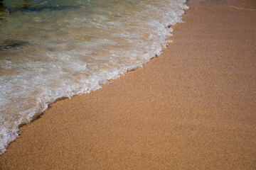 Sea sandy beach and waves