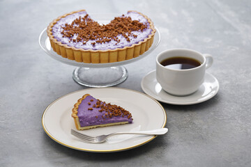 homemade ube pie topped with latik, Filipino dessert