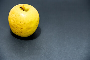 background black texture free space for text.Yellow apple 