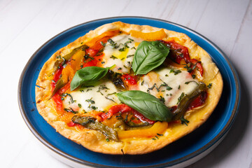 Original italian pizza with colored peppers
