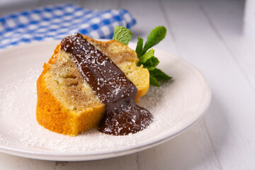 Coffee cake traditional spanish recipe with chocolate on the top.