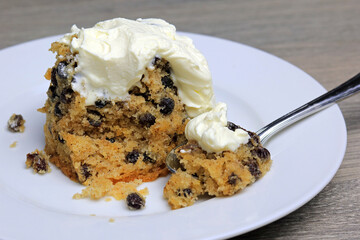 Spotted Dick Steam Pudding Served With Fresh Cream