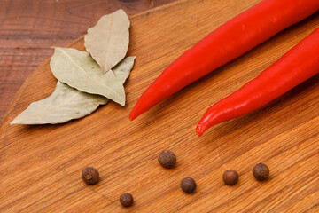 Red chili peppers and bay leafs
