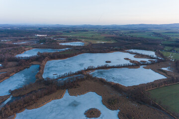 Guttau ponds lakes frozen lakes winter snow ice 1000 lakes tousand lakes grey blue sky moody mood