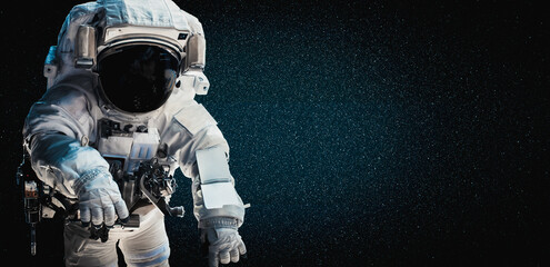 Astronaut spaceman do spacewalk while working for space station in outer space . Astronaut wear...