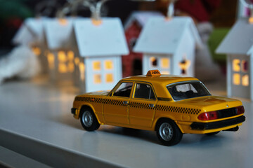 toy car on the background of houses