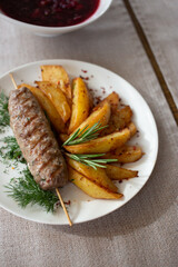 Lula with French fries, rosemary and dill