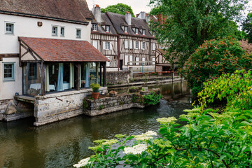 Fototapeta na wymiar Eure River embankment with old houses in a small town Chartres, France