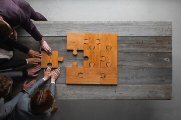 Business teamwork with puzzle