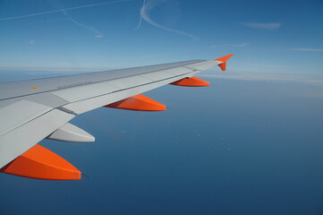 Fototapeta premium With a beautiful blue sky flying over the North Sea, with many ships