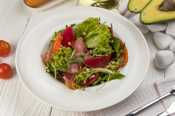 Salad with eel on a white background
