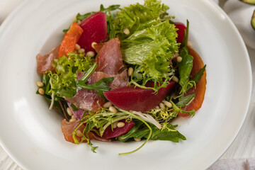Salad with eel on a white background
