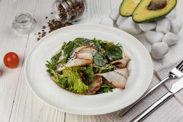 Salad with eel on a white background
