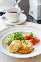 eggs benedict with fresh salad