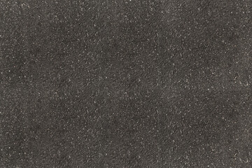 Black asphalt road texture and background. Horizontal tarmac grey grainy on asphalt road.