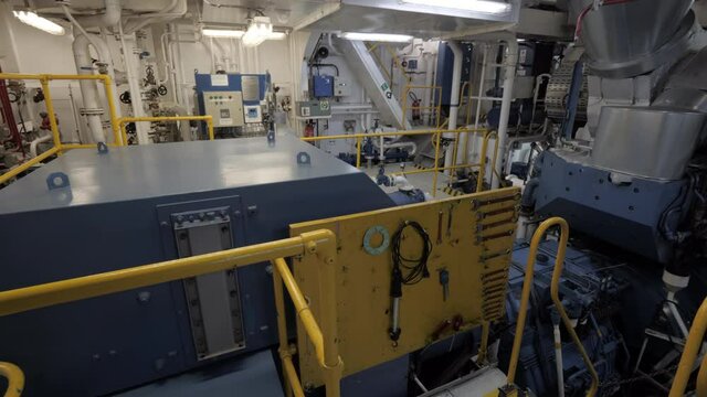 Engine with shaft generator in engine room of vessel