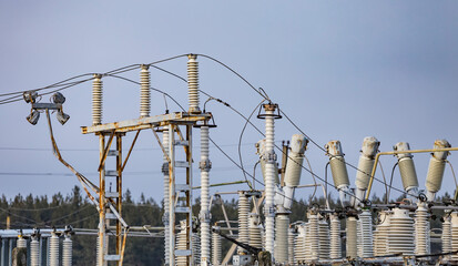 High voltage obsolete vintage electrical substation. Closeup on wiring, connections and insulators...