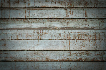 Old rustic wooden planks with shabby peeling paint. Light gray vignetted texture or background (horizontal 3:2 format). Empty template for design, copy space